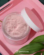 Jar of pink powder with a white lid on a pink tray, featuring the brand 'glamura.me'.